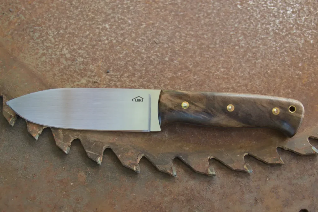 Bespoke Knife 12 handmade knife with stabilised walnut handle scales, brass Corby bolts and red G10 liners